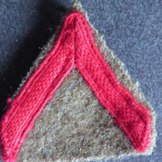Galon de 1° Classe PDL sur tissu kaki avec crochets
