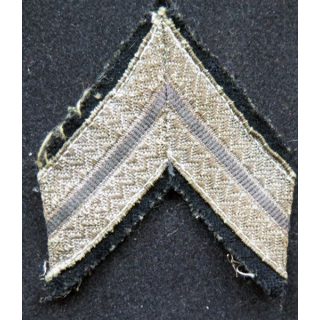 Galon argenté de gendarme sur tissu bleu noir