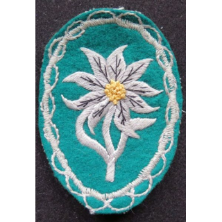 Insigne tissu cousu de l'Edelweiss sur tissu vert