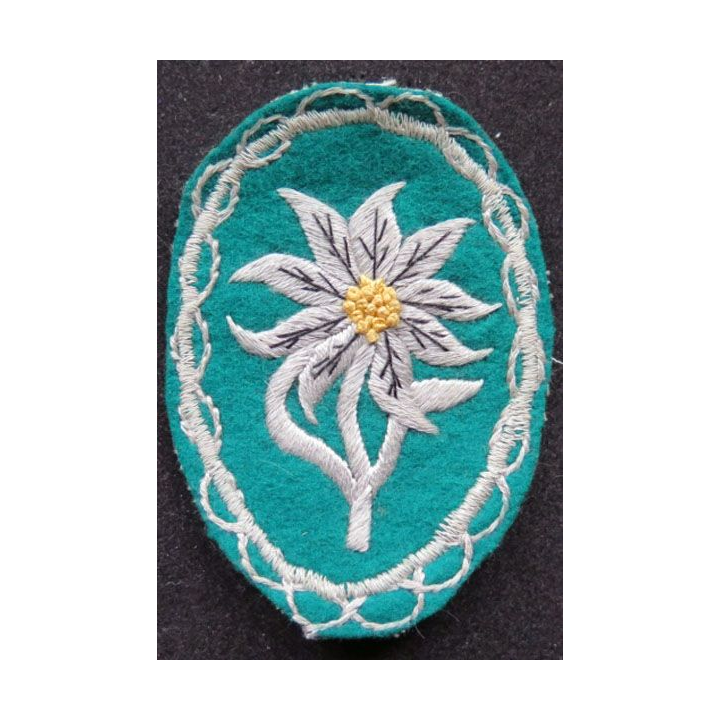 Insigne tissu cousu de l'Edelweiss sur tissu vert