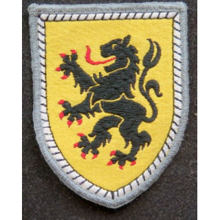 insigne tissu inconnu lion sur fond jaune bordé de gris