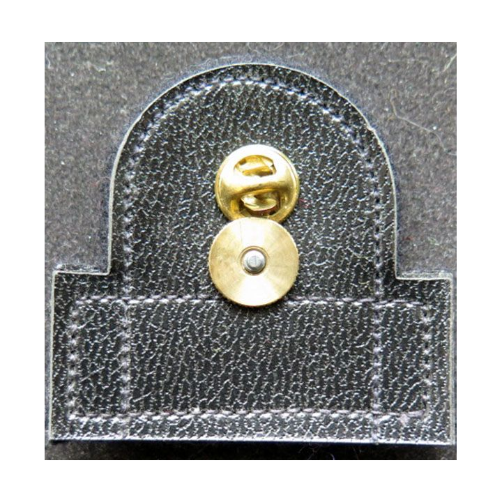 insigne métallique de l'US NAVY sur cuir