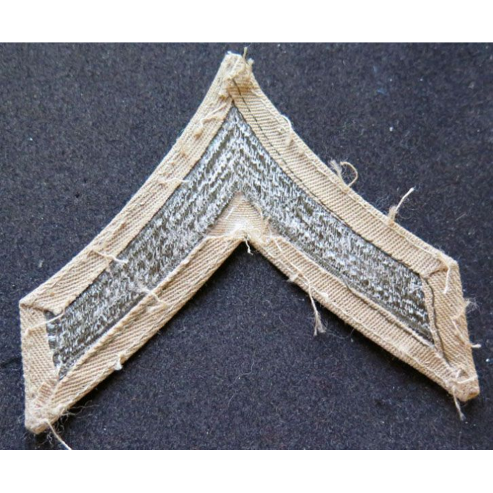 Galon de private first class US sur drap kaki