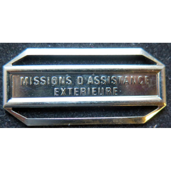 Barrette " MISSIONS D'ASSISTANCE EXTÉRIEURE " en métal argenté