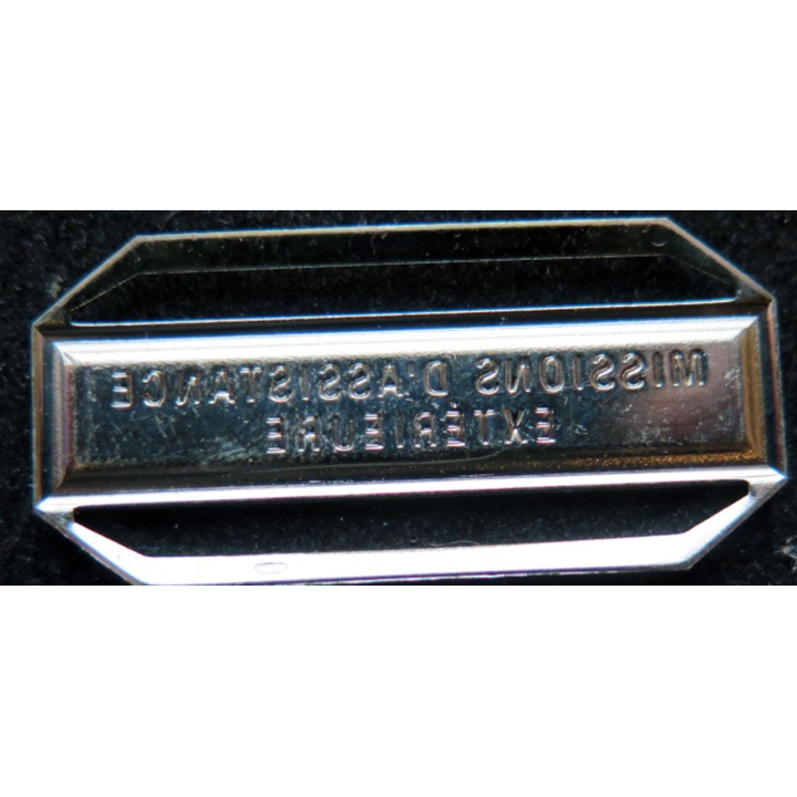 Barrette " MISSIONS D'ASSISTANCE EXTÉRIEURE " en métal argenté