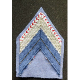 Galon de caporal chef ADL bleu et argent sur tissu bleu clair avec crochets