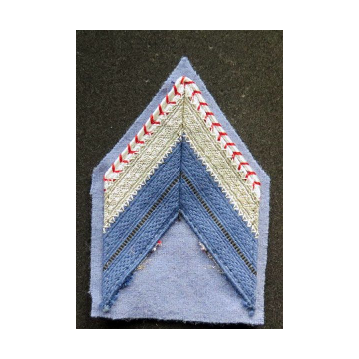 Galon de caporal chef ADL bleu et argent sur tissu bleu clair avec crochets