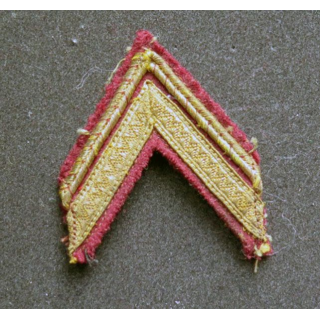Galon de sergent ADL sur tissu marron