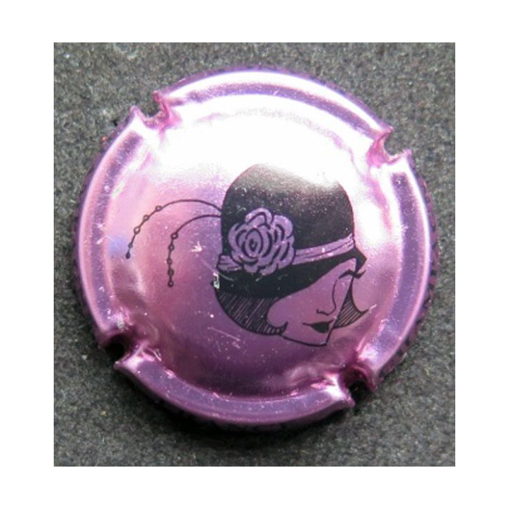 Capsule Muselet de bouteille de champagne tête de Coco sur fond rose