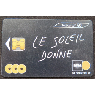 télécarte 50 unités France télécom RFM Le Soleil donne