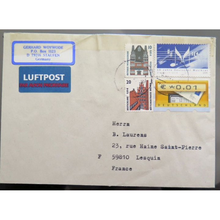 Enveloppe Luftpost par avion avec 4 timbres Allemagne