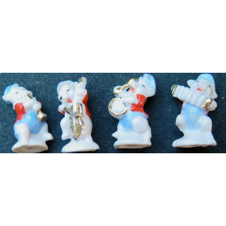 Quatre petits cochons musiciens hauteur en céramique 3,3 cm