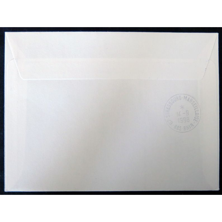 Enveloppe souvenir : Assistance du bateau La Curieuse aux Kerguelen, timbre TAAF et la Curieuse avec signature