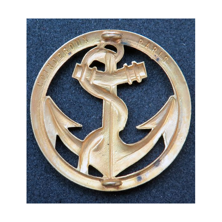 Insigne de béret des Troupes de Marine Fabrication Coinderoux sur support bleu Marine