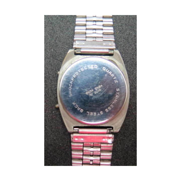 Montre Myon Flatline à quartz made in Hong Kong avec certificat d'achat 1981