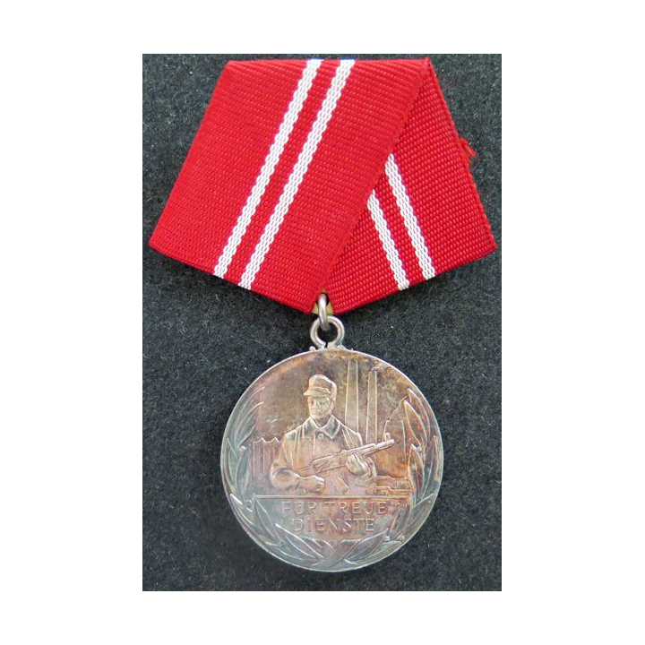 RDA : médaille et diplôme attribué de la médaille argent pour les loyaux services