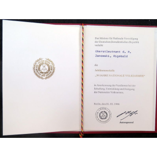 RDA : pochette cartonnée avec diplôme de la médaille jubilée des 30 années dans l'armée populaire