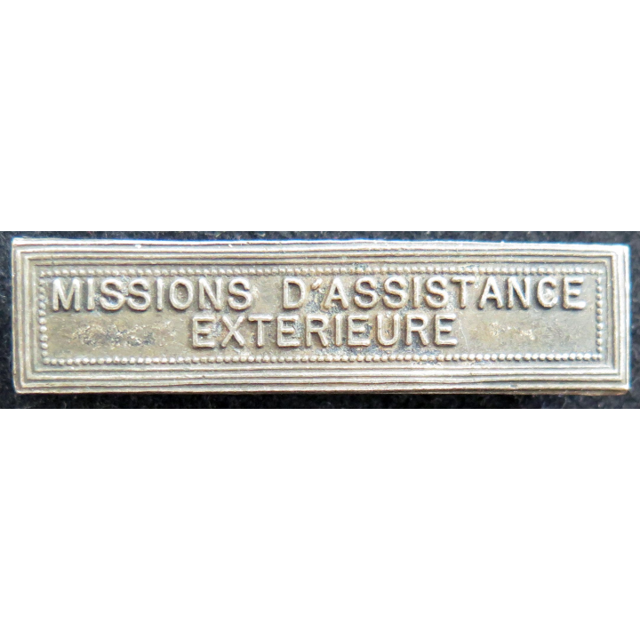 Barrette " MISSIONS D'ASSISTANCE EXTÉRIEURE " en métal argenté