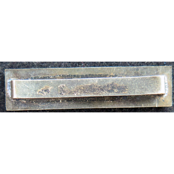 Barrette " MISSIONS D'ASSISTANCE EXTÉRIEURE " en métal argenté