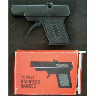 Pistolet amorces bandes dans sa boite