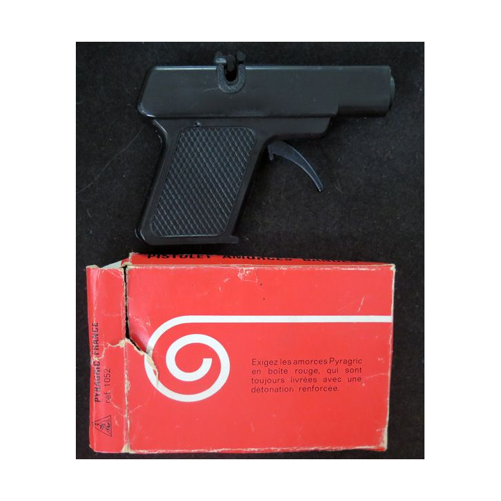 Pistolet amorces bandes dans sa boite