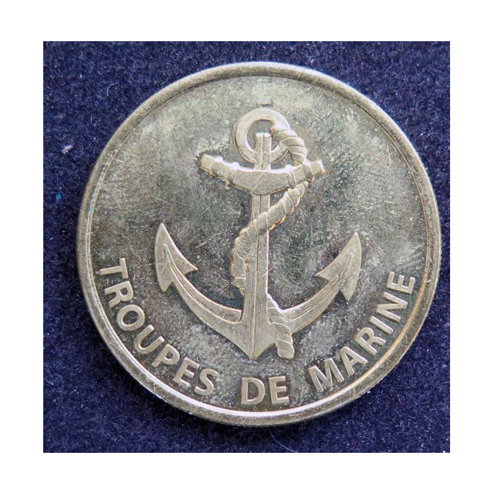 RMT : pièce métallique (coin) du régiment de marche du Tchad