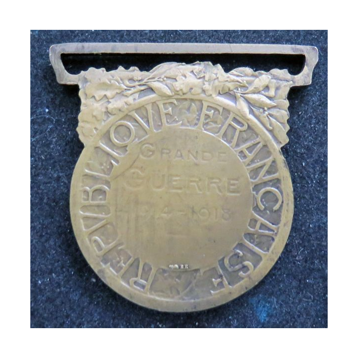 FRANCE : médaille commémorative de la guerre 1914-1918  en bronze avec copie livret militaire