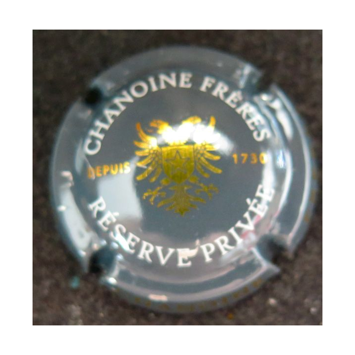 Capsule Muselet de bouteille de champagne CHANOINE Frères n° 5a Gris foncé, or et blanc