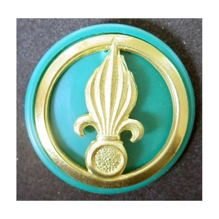 Insigne de béret de la légion Fabrication Drago sur son support vert
