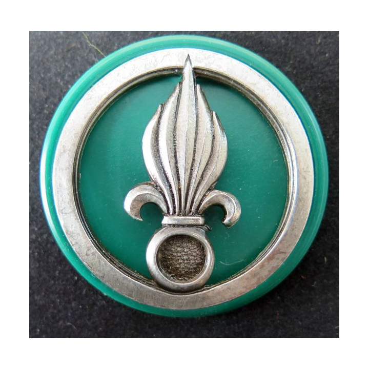 Insigne de béret de la légion Fabrication Drago sur son support vert