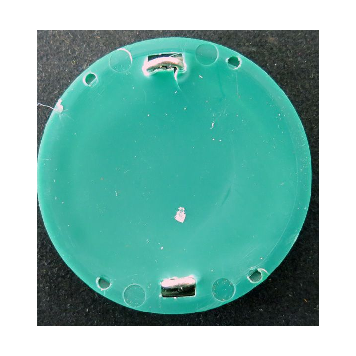 Insigne de béret de la légion Fabrication Drago sur son support vert