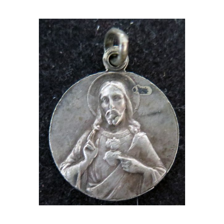 Médaille en métal argenté du Coeur de jésus diamètre 1,8 cm