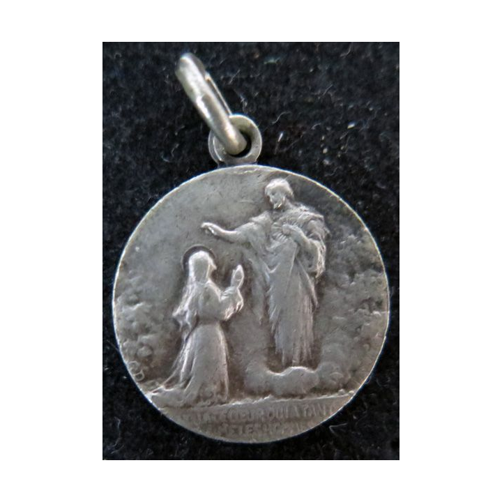 Médaille en métal argenté du Coeur de jésus diamètre 1,8 cm