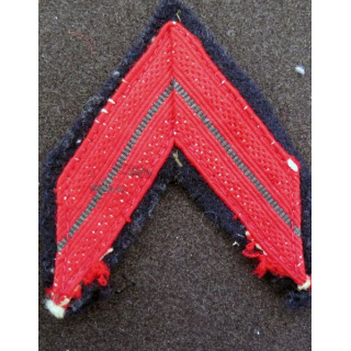 Galon de Caporal PDL rouge sur tissu bleu noir