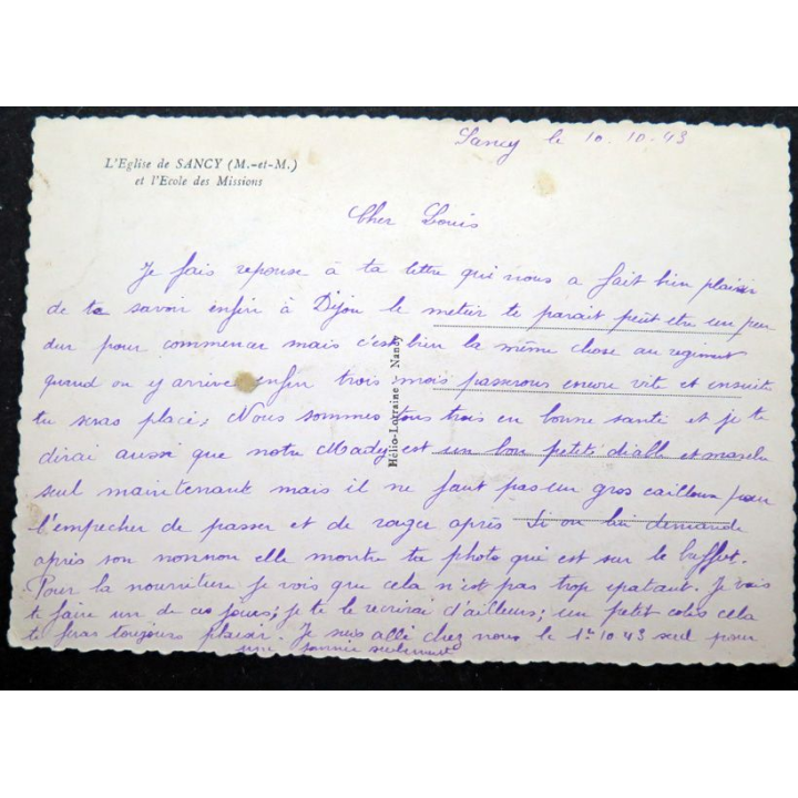 Carte postale de l'Eglise de Sancy et l'école des missions 1943