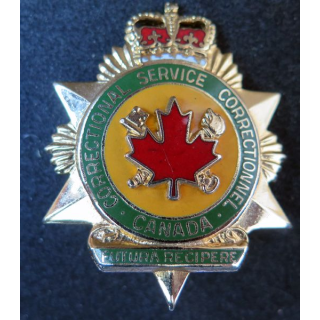 Insigne métallique de l'administration pénitentiaire service correctionnel canadien