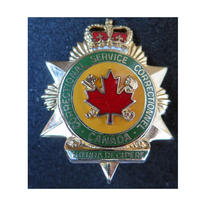 Insigne métallique de l'administration pénitentiaire service correctionnel canadien
