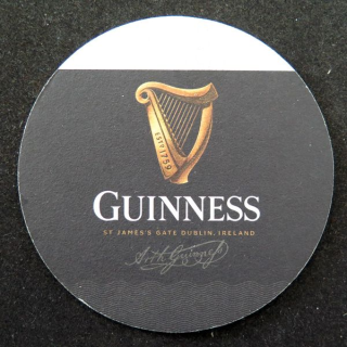 DESSOUS DE VERRE A BIÈRE Guinness de largeur 9,3 cm
