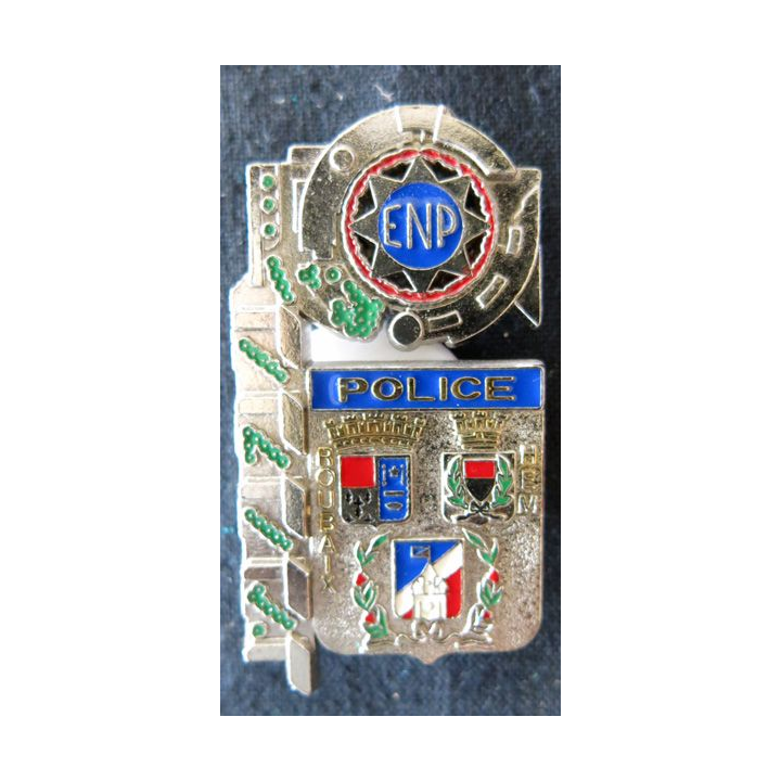 POLICE : insigne métallique de l'Ecole nationale de Police de Roubaix de fabrication Delsart Sens