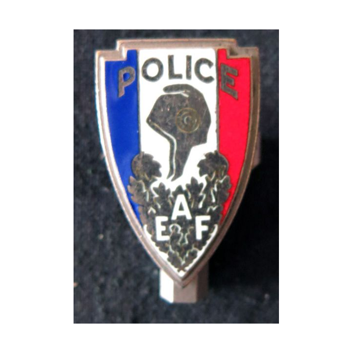 POLICE : insigne métallique de coiffure de la Police nationale AEF de fabrication Fraisse en émail