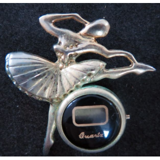 Pin's Danseuse montre à quartz