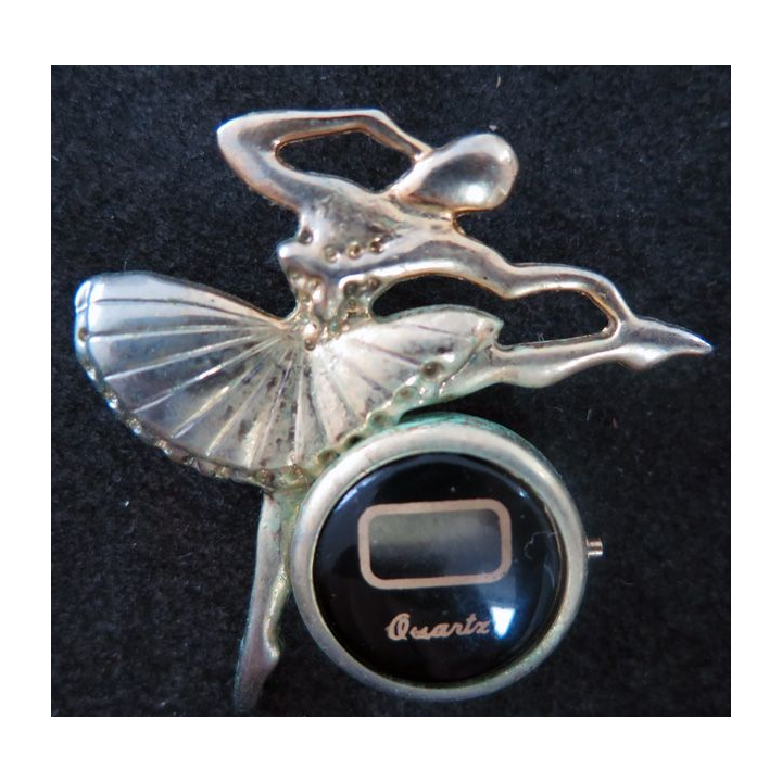 Pin's Danseuse montre à quartz
