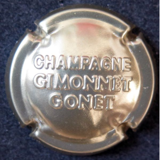 Capsule Muselet de bouteille de champagne GIMONNET-GONET n° 23 estampée or pâle