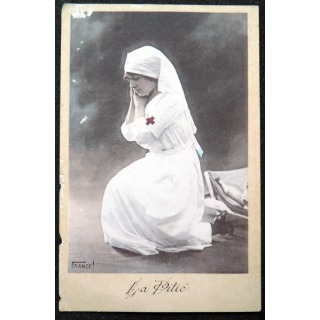 Carte postale La Pitié timbrée (petites déchirures)