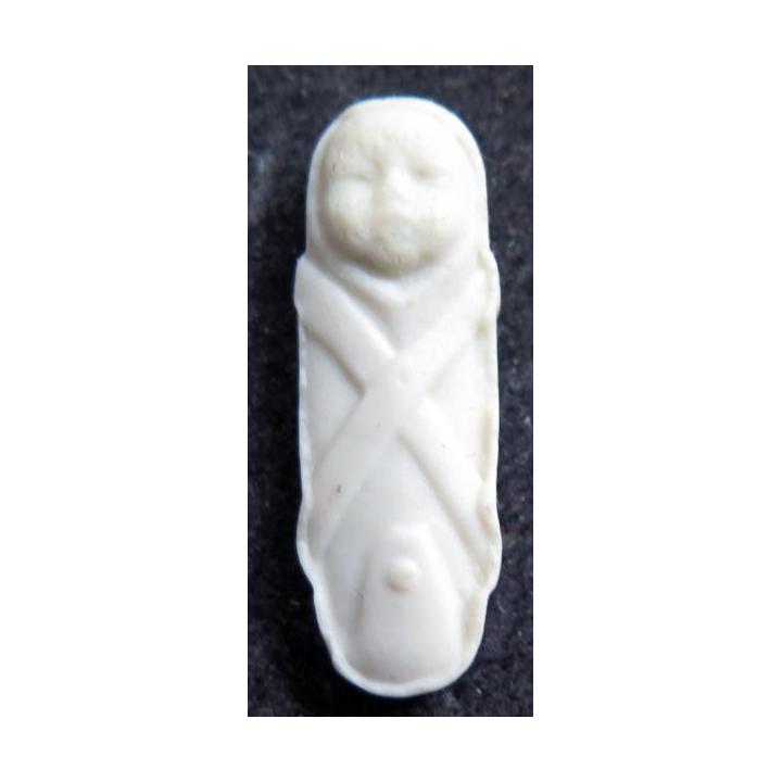 Fève bébé emmailloté céramique
