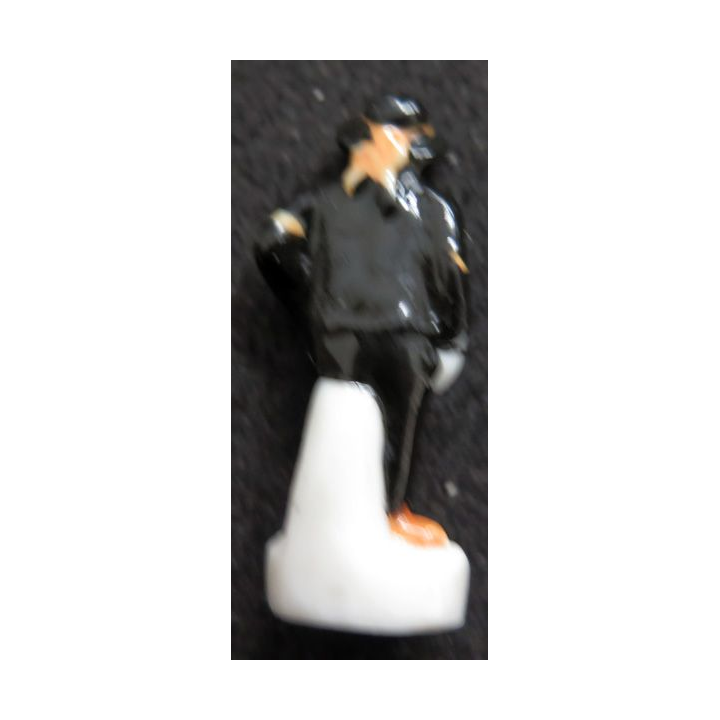 fève homme en costume noir en céramique