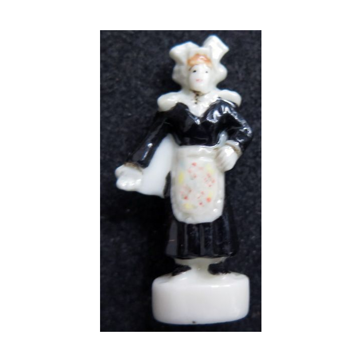 fève femme à la robe noire en céramique