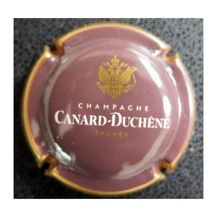 Capsule Muselet de bouteille de champagne CANARD-DUCHENE n° 77i marron contour or