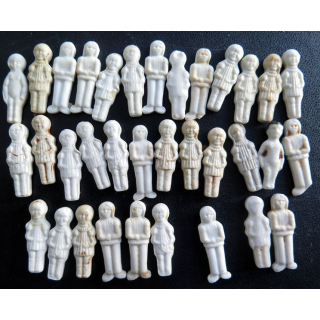 Lot de 34 Fèves type  Petit enfant en céramique