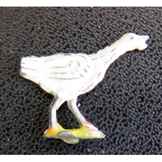 SOLDAT DE PLOMB : petite poule en fer blanc peinte queue tronquée